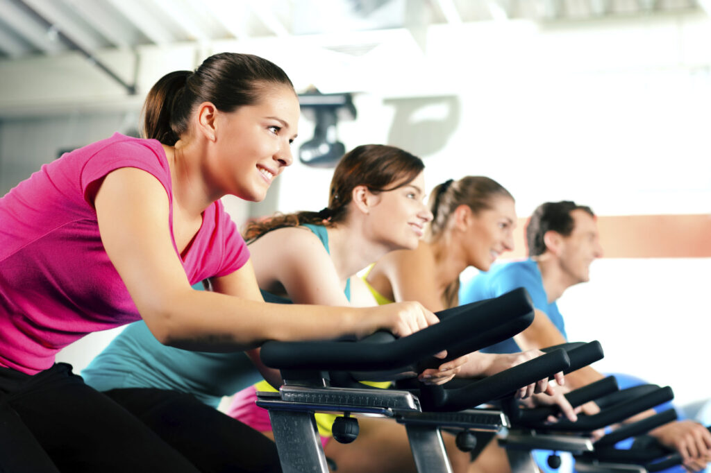 Fit Women on Exercise Bikes