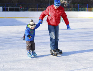 Dad Ice Skating with Son