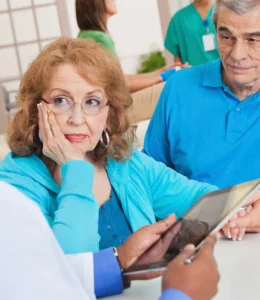 mens-physical-doctors-appointment-with-wife-istock_000021719341medium-1024x682