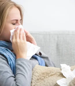 woman-with-cold-blowing-nose-istock_000027151899large-scaled-1-1024x682